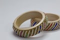 Close up of pair of bangles isolated on white background with space for text Royalty Free Stock Photo