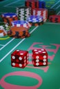 Close up of a pair of dice on a craps table. Selective focus.Gambling concept. 3d illustration