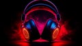 Close up of pair of headphones on black background with red light