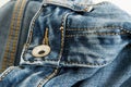 Close-up of a pair of jeans with the word Royalty Free Stock Photo
