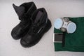 Close-up of pair of new black work boots made of leather with reinforced cape, high top on construction site, concept of special Royalty Free Stock Photo