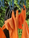 close - up of a pair of orange rubber gloves Royalty Free Stock Photo