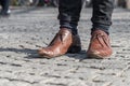 Close up of a pair of worn out shoes with relieved shoe sole Royalty Free Stock Photo