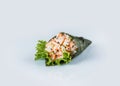 Japanese Temaki Hand Roll Sushi with Ebi black tiger shrimp, flying fish roe Tobiko caviar, avocado Royalty Free Stock Photo
