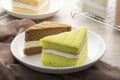 Close up pandan and coconut chiffon cake on white plate Royalty Free Stock Photo