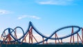 CLOSE UP: Panoramic view of a rollercoaster ride with sharp turns and twists. Royalty Free Stock Photo