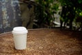 Close up paper cup on the rust table Royalty Free Stock Photo