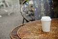 Close up paper cup on the rust table Royalty Free Stock Photo