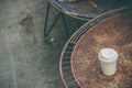 Close up paper cup on the rusty table Royalty Free Stock Photo