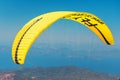 Close-up of a paraglider wing and blue sky in the background. Concept of active