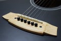 close up part of black accoustic guitar Royalty Free Stock Photo