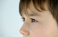 Close-up of part of child`s face, boy 10-12 years old, sad, stress problems, difficult childhood, victim of domestic violence, in