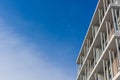 Close up part of condominium modern style on blue sky background