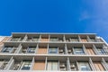Close up part of condominium modern style on blue sky background Royalty Free Stock Photo