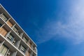 Close up part of condominium modern style on blue sky background Royalty Free Stock Photo