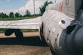 Close-up of part of the fuselage of an old military fighter jet, which has an open fuel system. The open tank of the aircraft, the Royalty Free Stock Photo