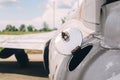 Close-up of part of the fuselage of an old military fighter jet, which has an open fuel system. The open tank of the aircraft, the Royalty Free Stock Photo