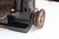 Close-up part of an old sewing machine and detail on adjust thread Royalty Free Stock Photo