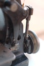 Close-up part of an old sewing machine and detail on adjust thread Royalty Free Stock Photo