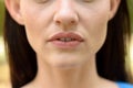 Close up on the parted lips of a thin woman Royalty Free Stock Photo