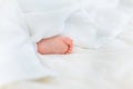 Close-up partial view of cute baby boy sleeping under white blanket Royalty Free Stock Photo