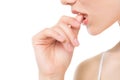 Close-up partial view of seductive young woman biting thumb Royalty Free Stock Photo