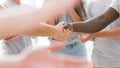 Close up. participants of the youth forum shaking hands Royalty Free Stock Photo