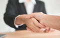 Close up of partnership handshake successful after negotiating business. Connection deal concept.