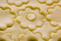 Close up of pastry dough cut in flower shape for biscuits Royalty Free Stock Photo