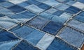 A close-up of a patchwork quilt made from repurposed denim fabric Royalty Free Stock Photo