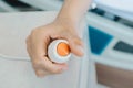 Close up of patient hand pressing emergency button in hospital ward for calling nurse or health care staff. Royalty Free Stock Photo