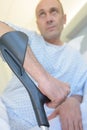 Close up patient holding crutches