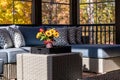 Cozy Patio Corner in Screened Porch with Flower Pot