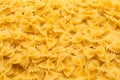 Pattern made of raw farfalle pasta