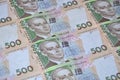 A close-up of a pattern of many Ukrainian currency banknotes with a par value of 500 hryvnia. Background image on business in Ukr Royalty Free Stock Photo