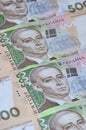 A close-up of a pattern of many Ukrainian currency banknotes with a par value of 500 hryvnia. Background image on business in Ukr Royalty Free Stock Photo