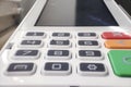 Close-up of a payment terminal keypad showing numbers and function buttons, commonly used in retail for secure transacti Royalty Free Stock Photo
