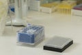 Close-up of a PCR plate on a plate holder with a cooling block with some test samples Royalty Free Stock Photo