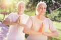 Close up of peaceful family meditating outdoors Royalty Free Stock Photo