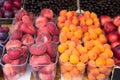 Close up of peaches and apricots at street market Royalty Free Stock Photo