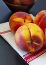 Close up of peaches on a table. Royalty Free Stock Photo