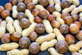 Close-up of peanuts, hazelnuts, brazil nuts (macadamia). Healthy food concept, rich harvest concept.