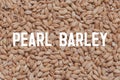 A close up of pearl barley grains. Raw porridge top view. Grain pattern. Vegan Raw Food. Royalty Free Stock Photo