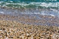 Close up of pebbles by the shore in Perdepera beach Royalty Free Stock Photo