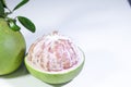 Close-up of a Peeled Pomelo on a White Background Royalty Free Stock Photo