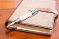 Close-up of pen on top of agenda or notebook Royalty Free Stock Photo