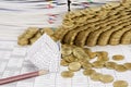 Close up pencil and bankruptcy house have gold coins collapse Royalty Free Stock Photo