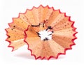 Close Up of Pencil Shaving with Red Trim on a White Background Royalty Free Stock Photo