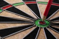 Pencil on target dart board, center point, head to target marketing and business success concept
