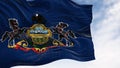 Close-up of Pennsylvania state flag waving on a clear day